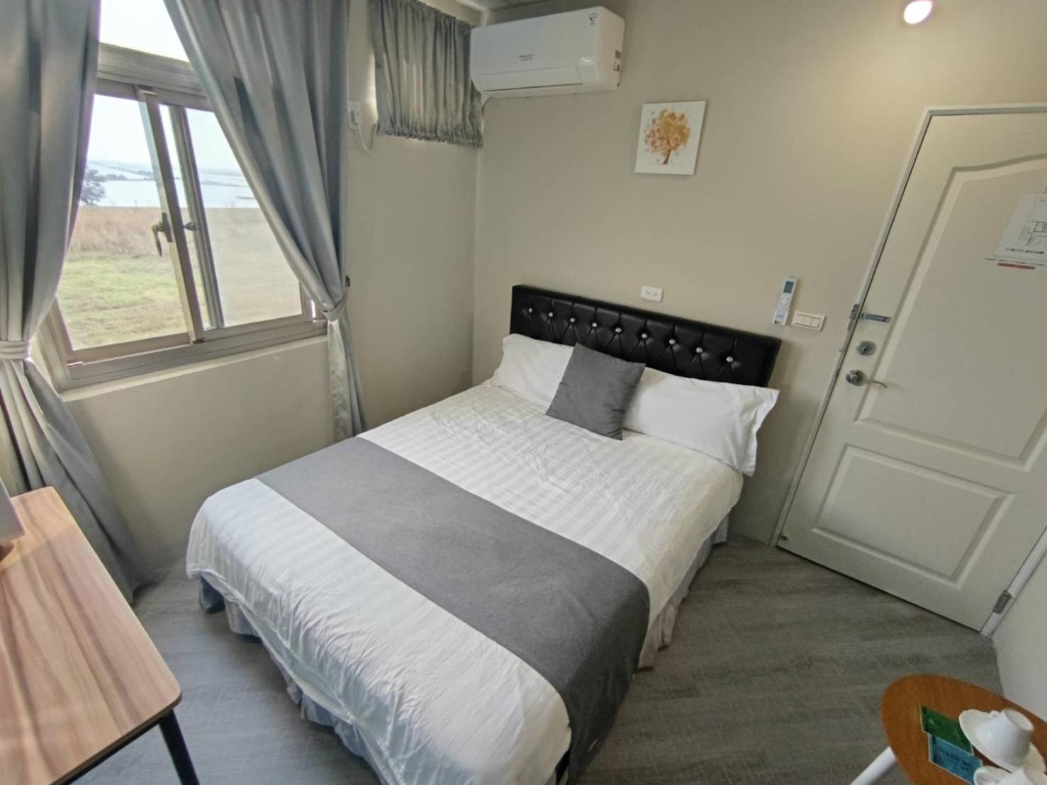 Light Shadow Apartment Budai Bagian luar foto